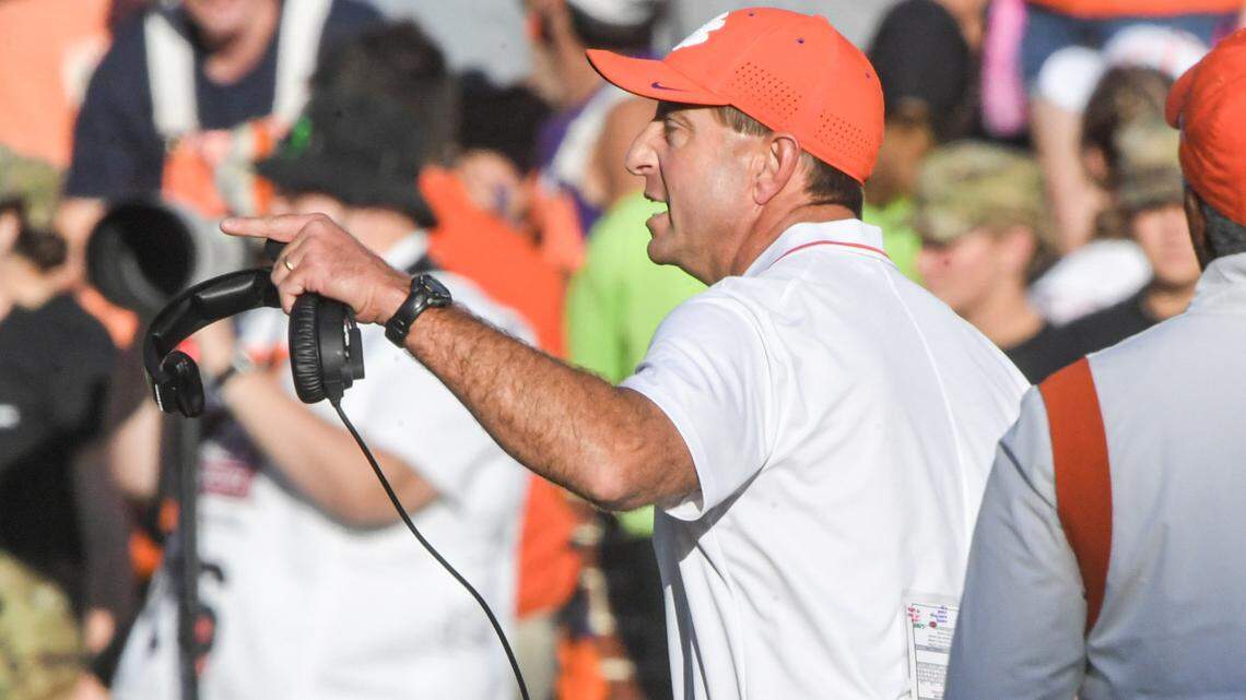 Clemson Tigers head coach Dabo Swinney communicates with a referee in the Wake Forest Demon Deacons game during the third quarter at Memorial Stadium.