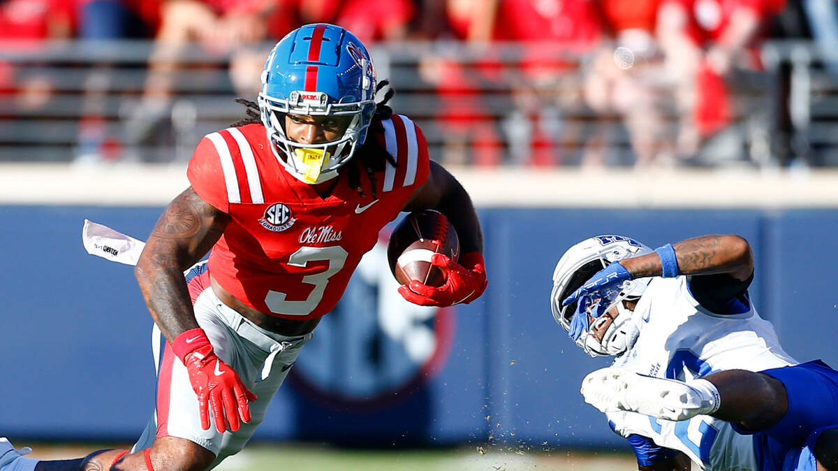 Mississippi Rebels wide receiver Antwane Wells Jr. (3) runs after a catch Sept. 7 as Middle Tennessee Blue Raiders defensive back Jalen Jackson (23) attempts to make the tackle during the second half at Vaught-Hemingway Stadium.