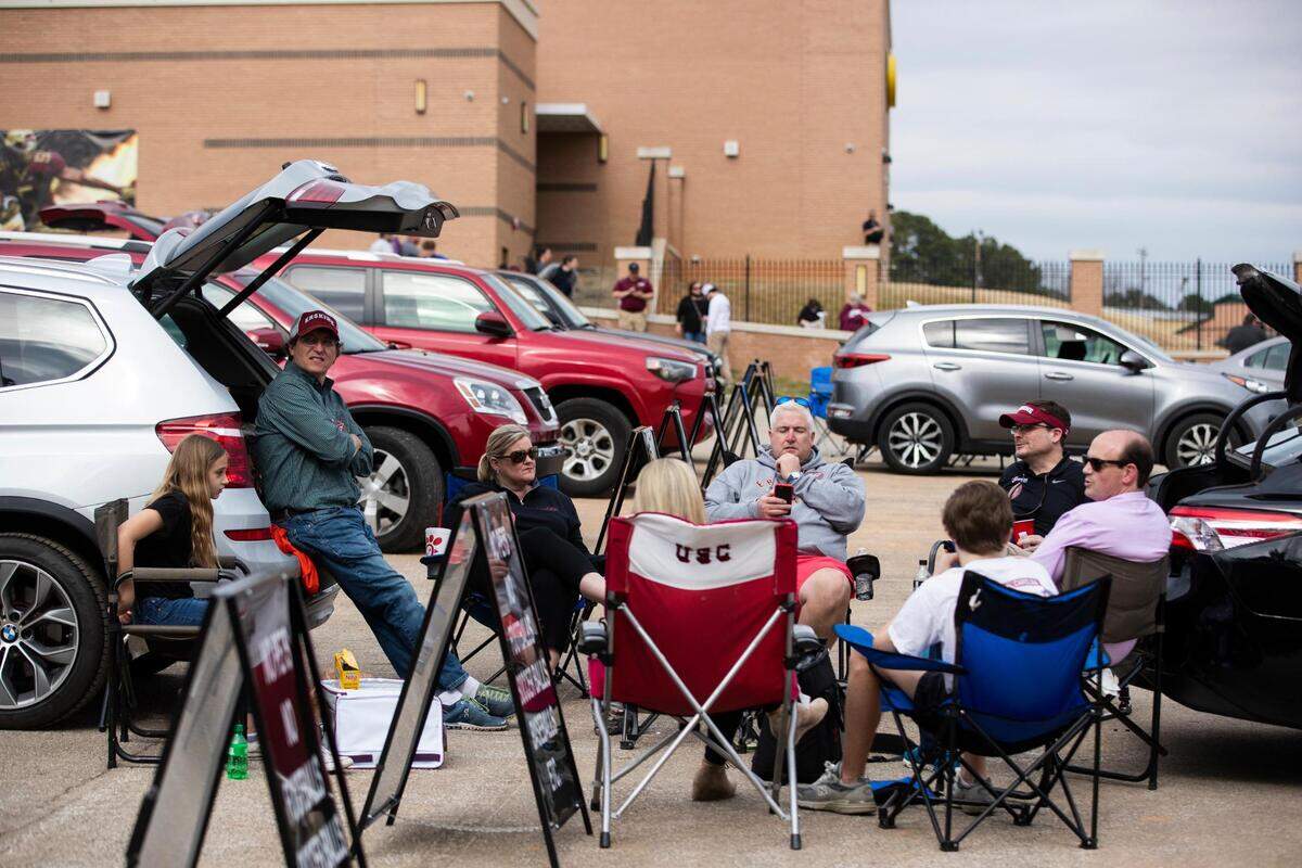 Fans tailgate before Erskine College plays Shorter University on Saturday, March 13, 2021.