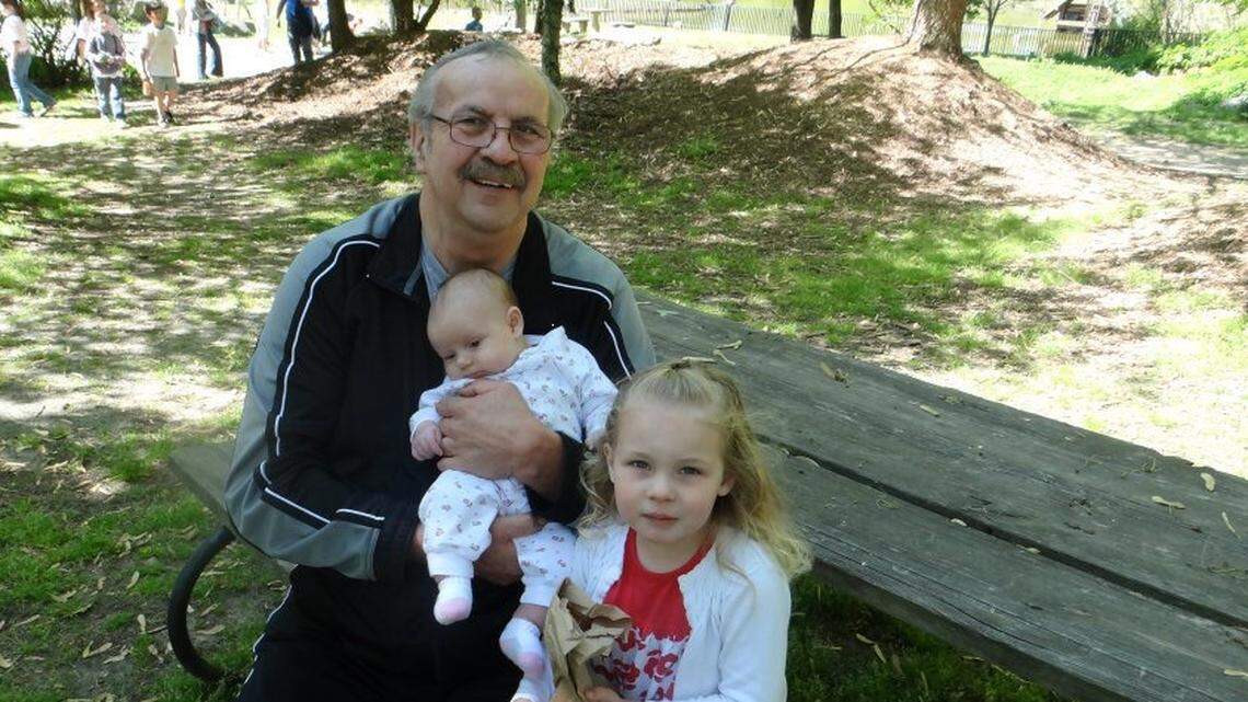 Terry Jorgensen with his granddaughters.