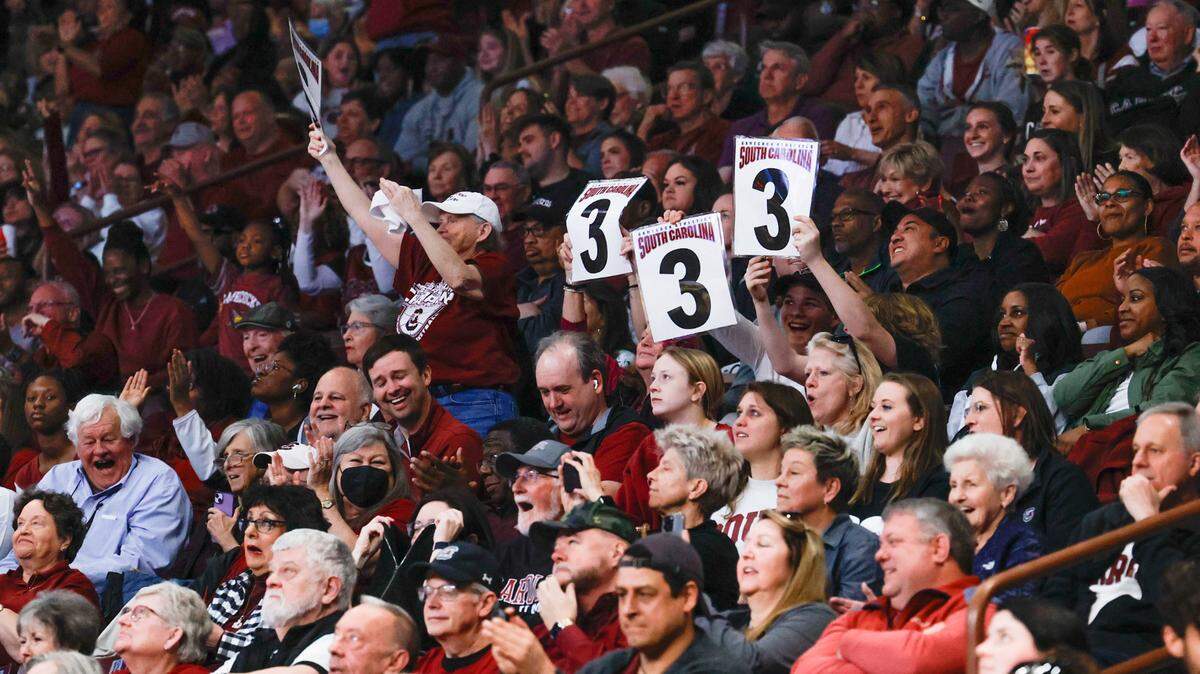 Gamecock fans celebrate during the first half of action during the second round of the NCAA Tournament at the Colonial Life Arena in Columbia, SC, on Sunday, March. 24, 2024.