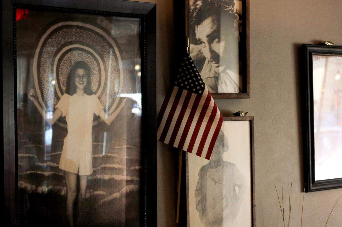 A picture of “Momma Rabbit,” the grandmother whose inheritance helped birth Momma Rabbit’s Nibbles and Sips, looks on at a Freedom Friday event on April 5, 2024.