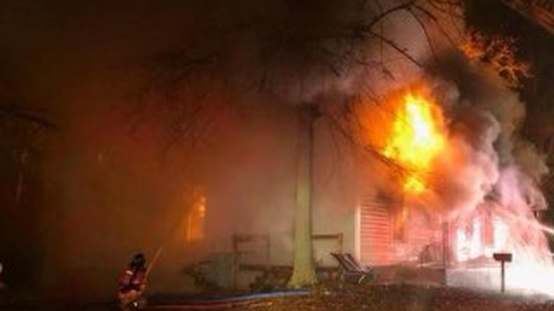 Fire fighters battle a burning building in Lexington County.