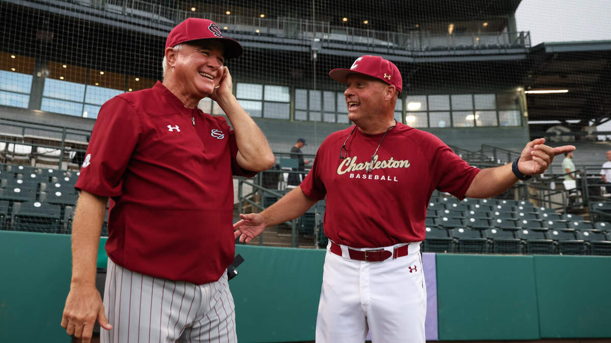 South Carolina head coach Paul Mainieri speaks with College of Charleston head coach Chad Holbrook before their game at Joseph P. Riley, Jr. Park in Charleston on Thursday, November 7, 2024.