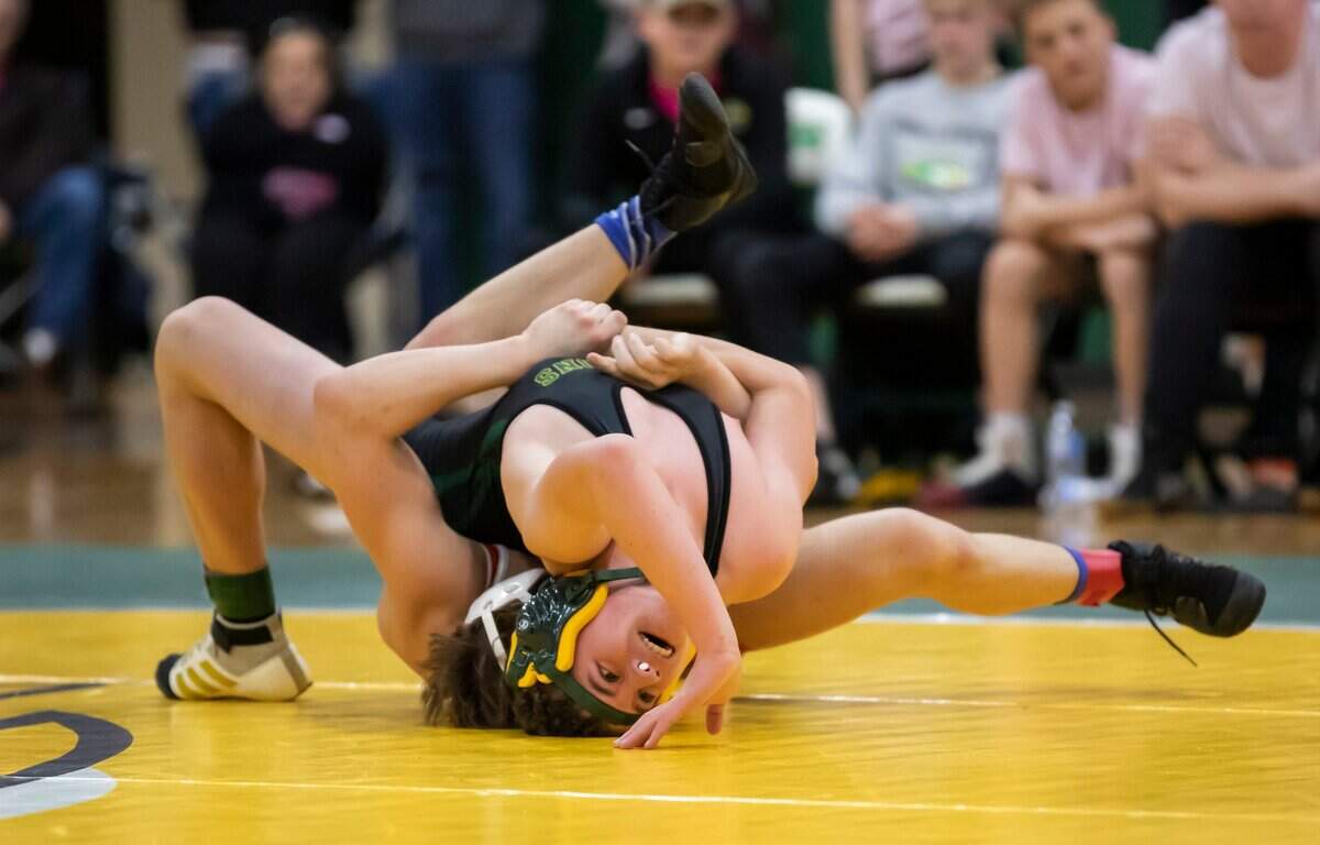 Jordan Desch of Ben Lippen is turned upside down during his match against Luke Martin of Hammond School during the SCISA 2022 Duals State Wrestling Tournament at Ben Lippen on Saturday, February 5, 2022.
