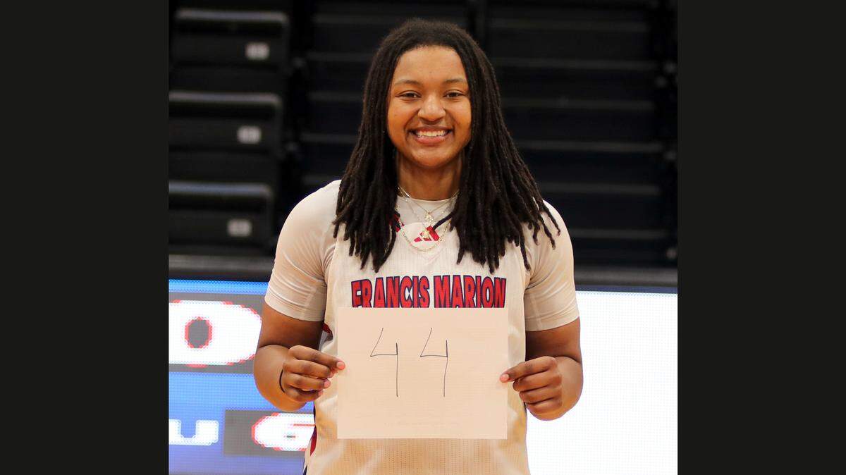 Francis Marion’s Lauryn Taylor poses for a photo after grabbing 44 rebounds in a game against North Greenville on Thursday.
