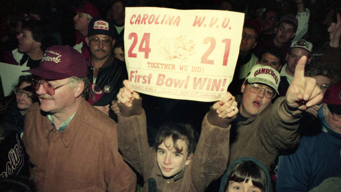 South Carolina fans greet the Gamecocks at the airport after the team’s Carquest Bowl win over West Virginia in January 2005.
