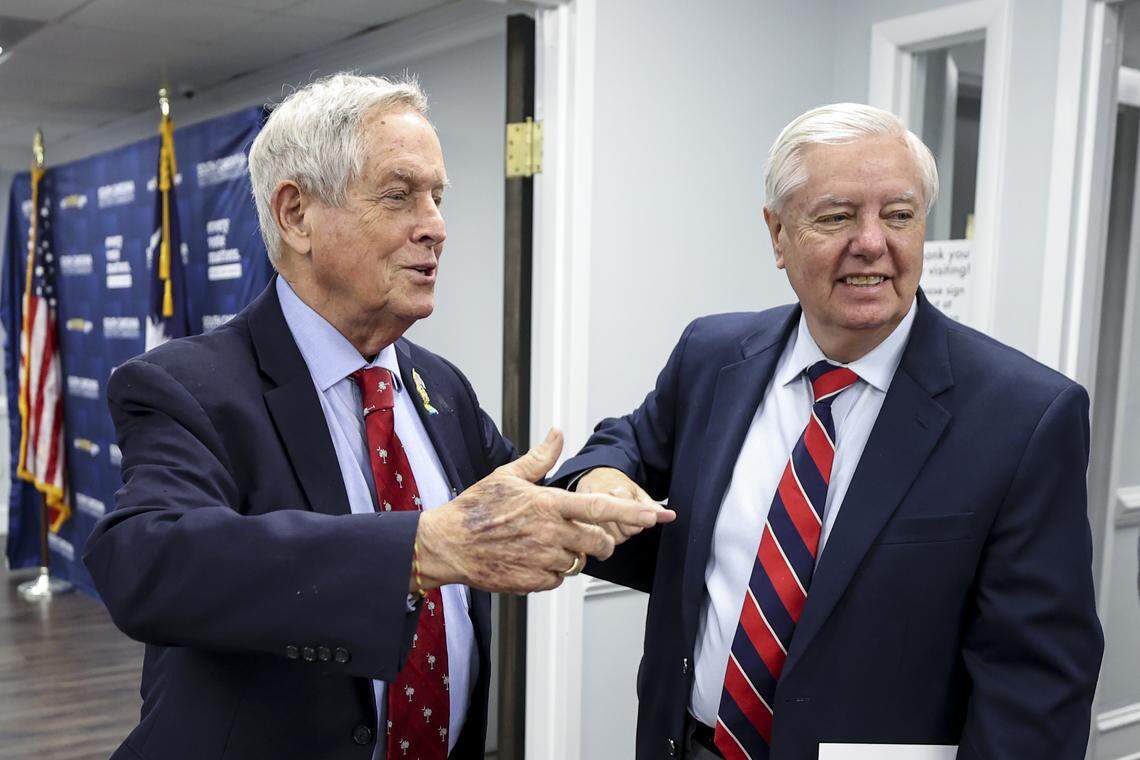 U.S. Rep. Joe Wilson and Sen. Lindsey Graham greet at the South Carolina Election Commission where they were filing for reelection on Monday, March 16, 2026.