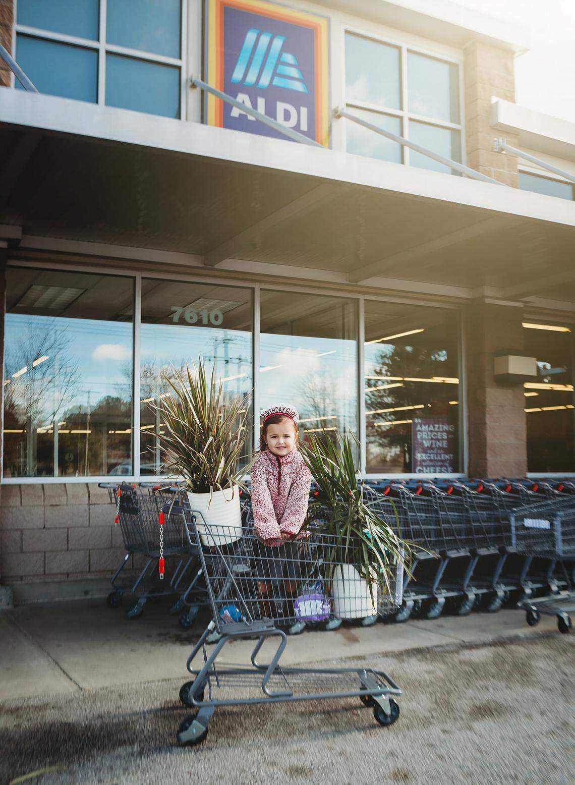 A family friend took pictures of Saylor at Aldi.