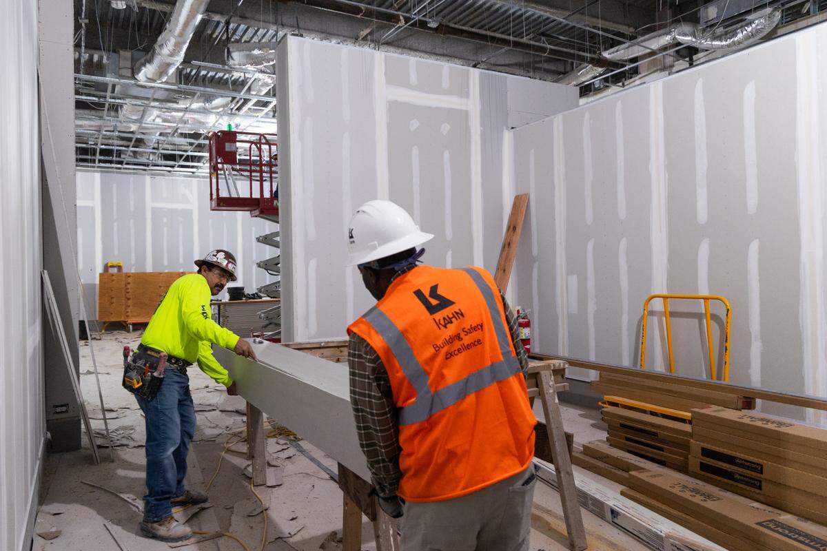 Workers install new drywall in the Columbia Museum of Art in downtown Columbia, South Carolina on Friday, February 28, 2025.
