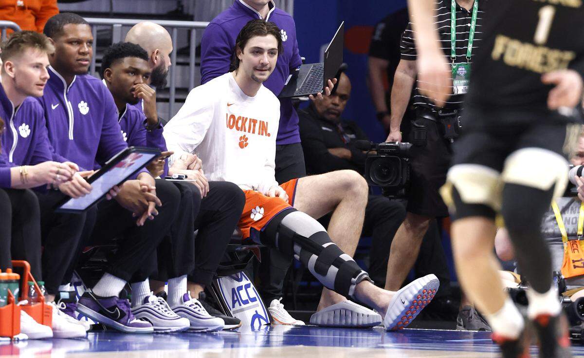 Clemson's Carter Welling his ACL during the 2026 ACC men’s basketball tournament in Charlotte.
