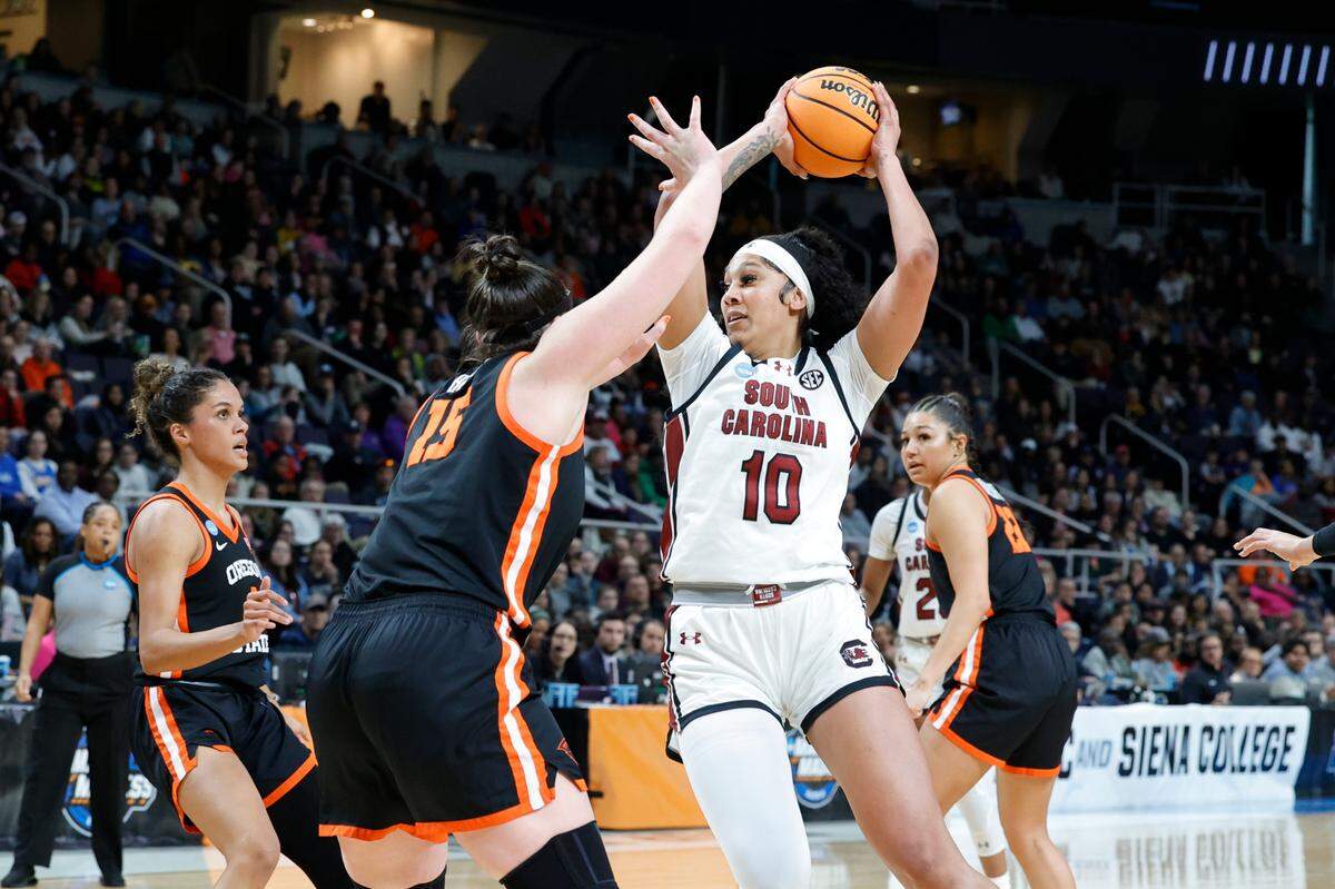 South Carolina’s Kamilla Cardoso (10) looks to shoot as Oregon State’s Raegan Beers (15) pressures during the Elite Eight round of the NCAA Tournament at the MVP Arena in Albany, New York on Sunday, March 31, 2024.