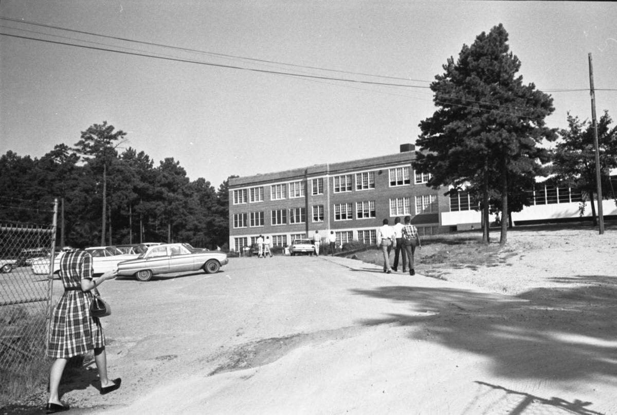 Eau Claire High School students arrive for classes on the first day of school in 1965. it was the first year that Eau Claire was integrated.
