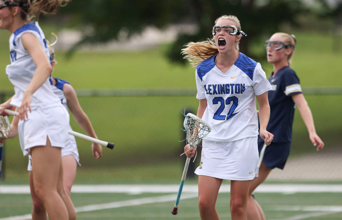 Isabelle Saville (22) of Lexington celebrates after scoring during the SCHSL Class 5A Division I Girls Lacrosse State Championships at Irmo High School on Saturday, May 3, 2025.