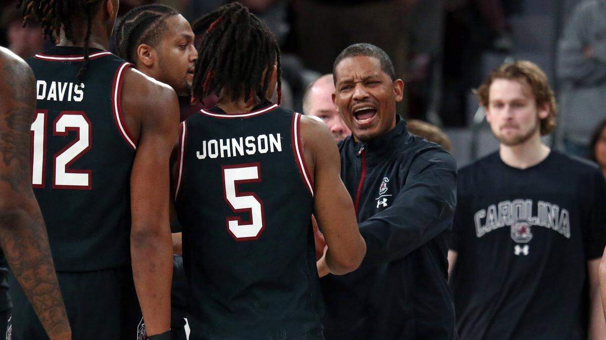 South Carolina Gamecocks head coach Lamont Paris reacts with guard Meechie Johnson (5) during a time out during the second half against the Mississippi State Bulldogs at Humphrey Coliseum.