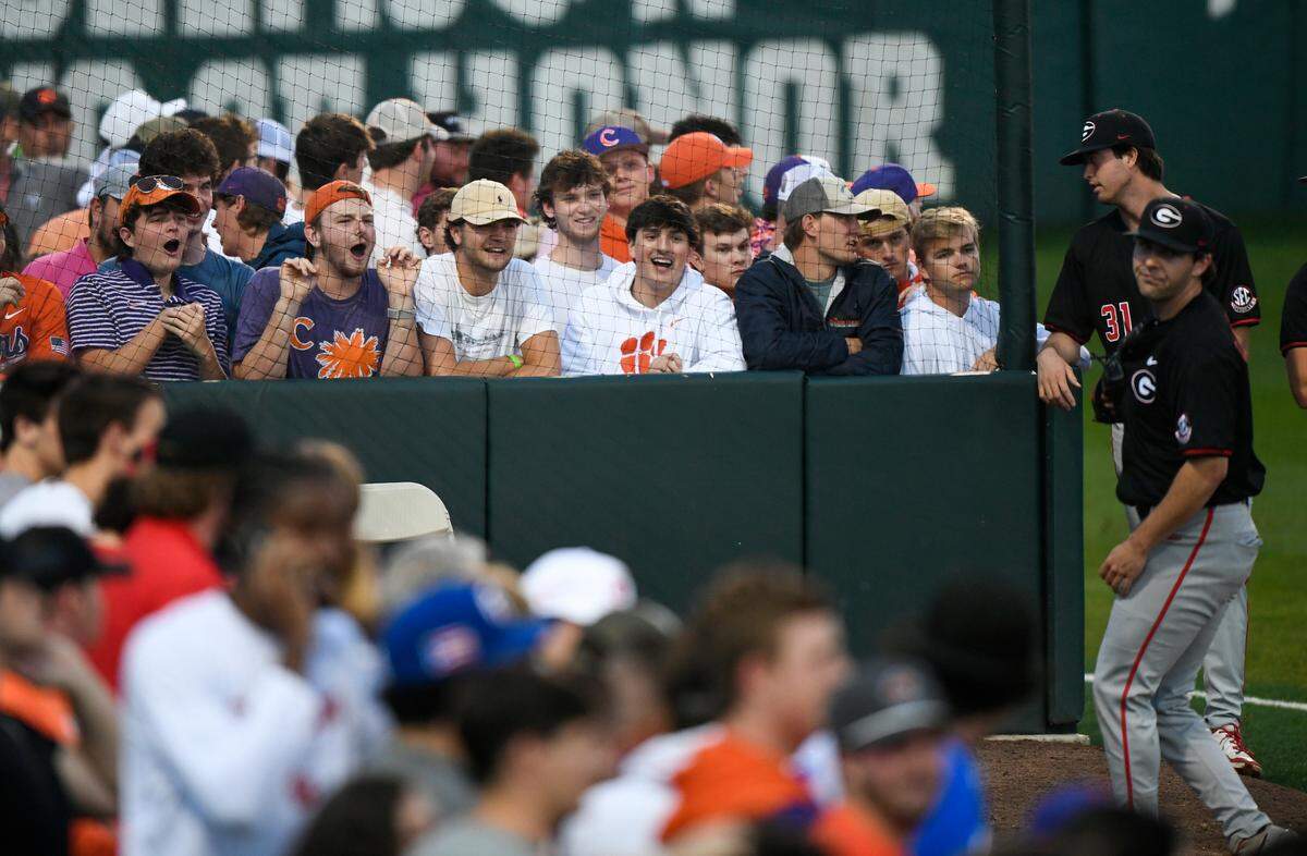 Clemson fans yell at Georgia players in the bullpen during the Tigers game against the Bulldogs Tuesday, April 22, 2025, at Clemson’s Doug Kingsmore Stadium.
