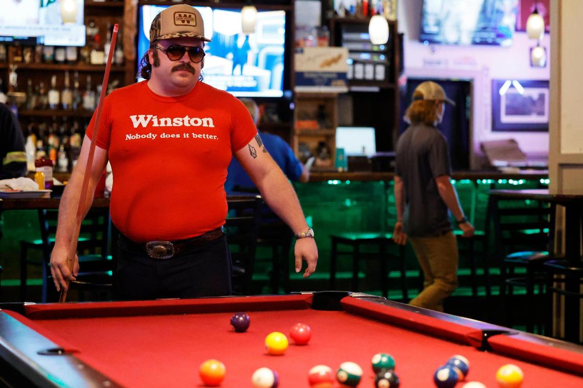 Orry Lee, better known as the Cornbread Cowboi, gets lunch at Henry’s Restaurant & Bar in Cayce, South Carolina on Wednesday, May 3, 2023. Lee has collected vintage clothes and styles for years.