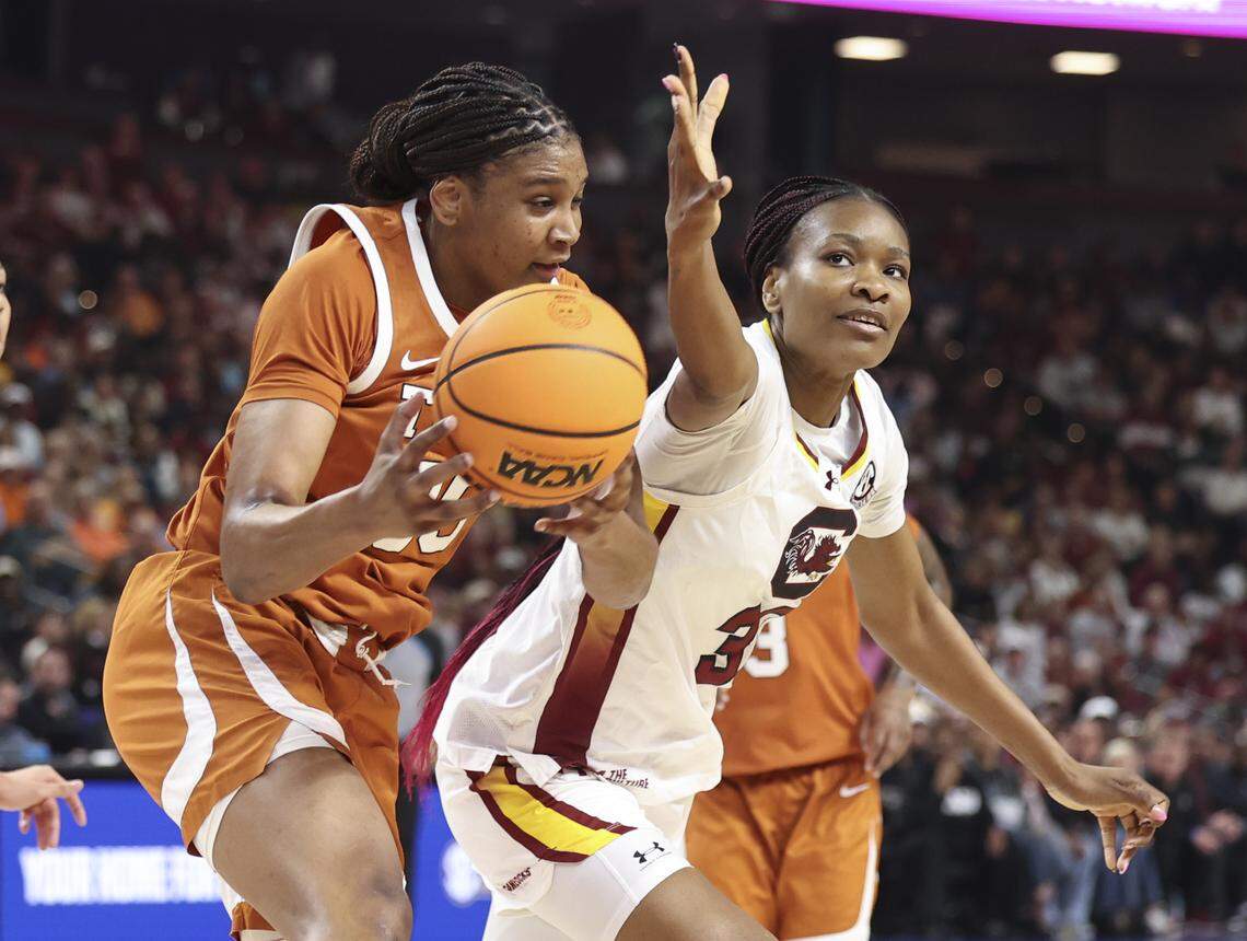 South Carolina's Maryam Dauda (30) tries for a rebound with Texas’s Madison Booker (35) during the first half of action of their women's basketball game in the SEC Tournament, against Texas at the Bon Secours Wellness Arena on Sunday, March 8, 2026.