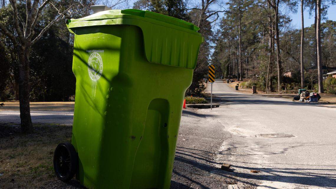 A Richland County waste bin waits to be collected in Forest Acres, S.C. on Feb. 21, 2025. Some homes in the area have not been annexed into Forest Acres, and have different waste collection services than their next-door neighbors.