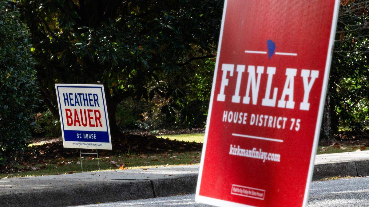 Signs for two candidates in the South Carolina House District 75, Heather Bauer and Kirkman Finlay on Devereaux Road on Thursday, October 31, 2024.