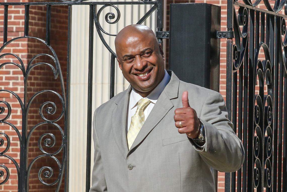 Suspended Chester County Sheriff Alex Underwood, gives members of the media a thumbs up after pleading not guilty to federal charges at the Matthew J. Perry Federal Courthouse in Columbia.