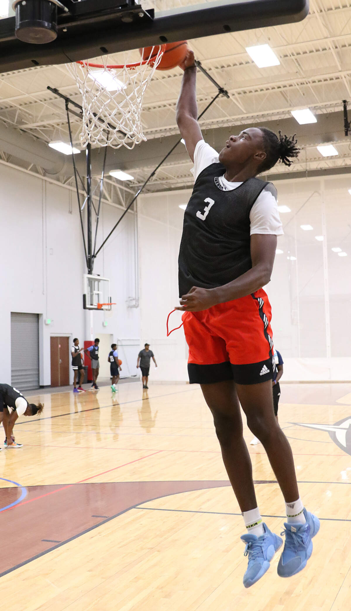 Dorman High and Upward Stars player Jordyn Surratt goes up for a dunk during last week’s workout at Upward Stars Center in Spartanburg on June 6.