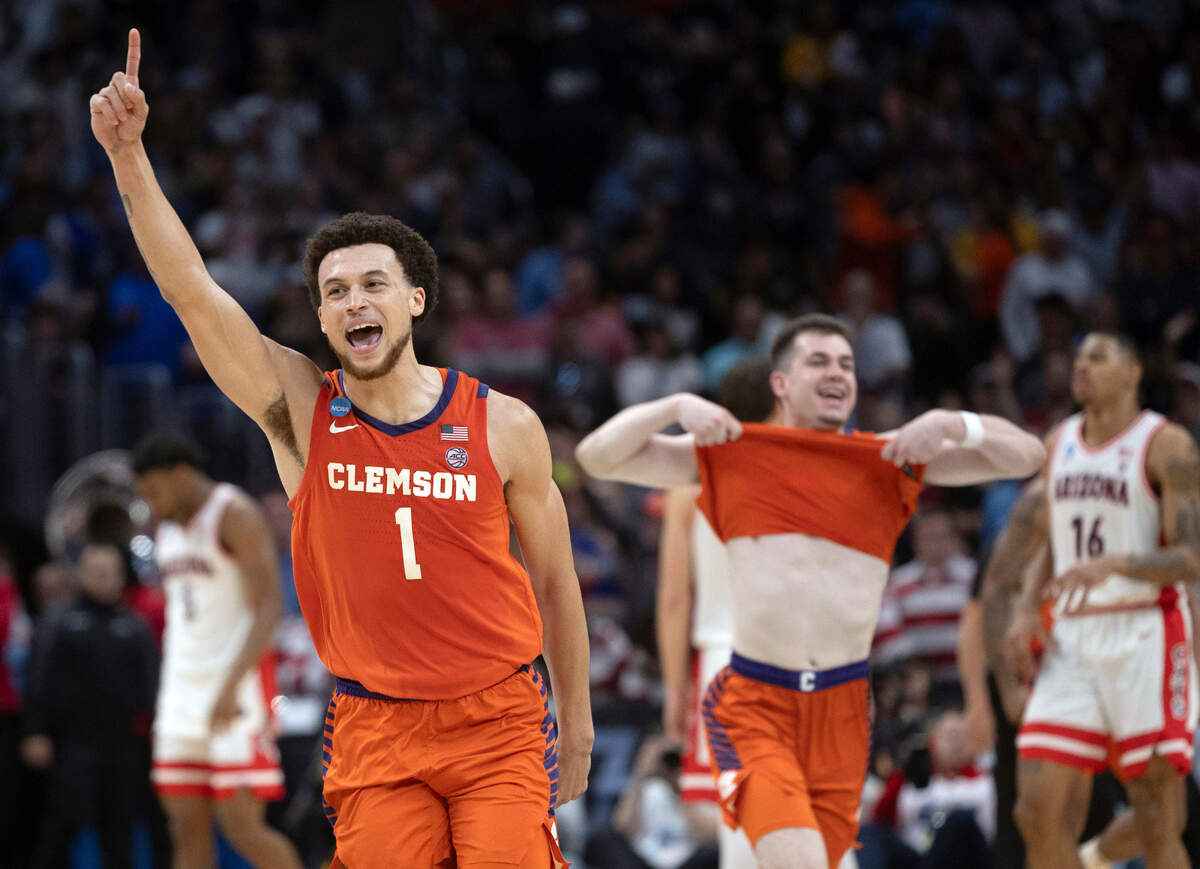 Clemson’s Chase Hunter (1) and Joseph Girard III (11) celebrate the Tigers’ 77-72 victory over Arizona in the NCAA Sweet Sixteen on Thursday, March 28, 2024 at Crypto.com Arena in Los Angeles, CA.