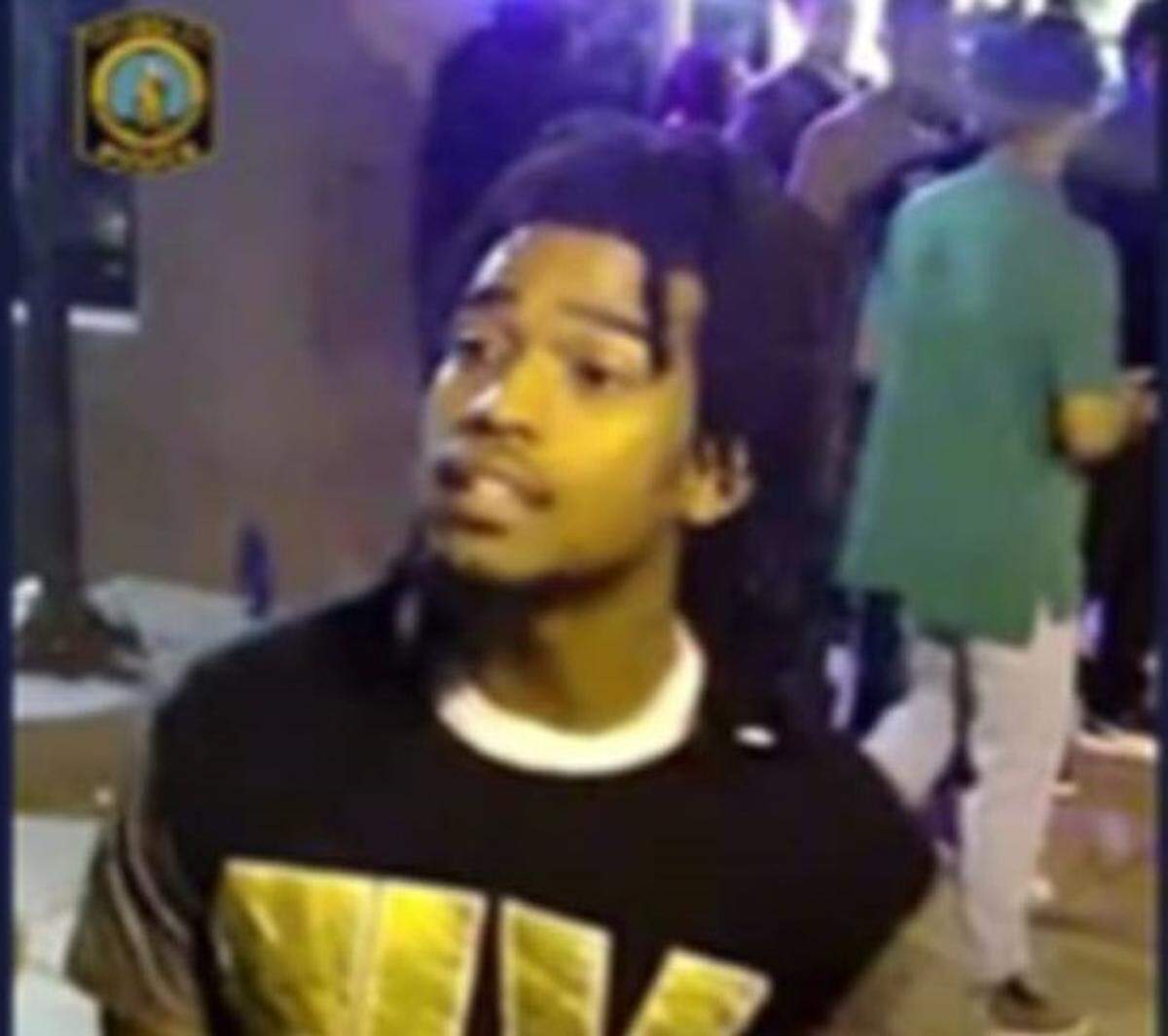 A surveillance photo of the Five Points shooting suspect captured on camera early Sunday morning.