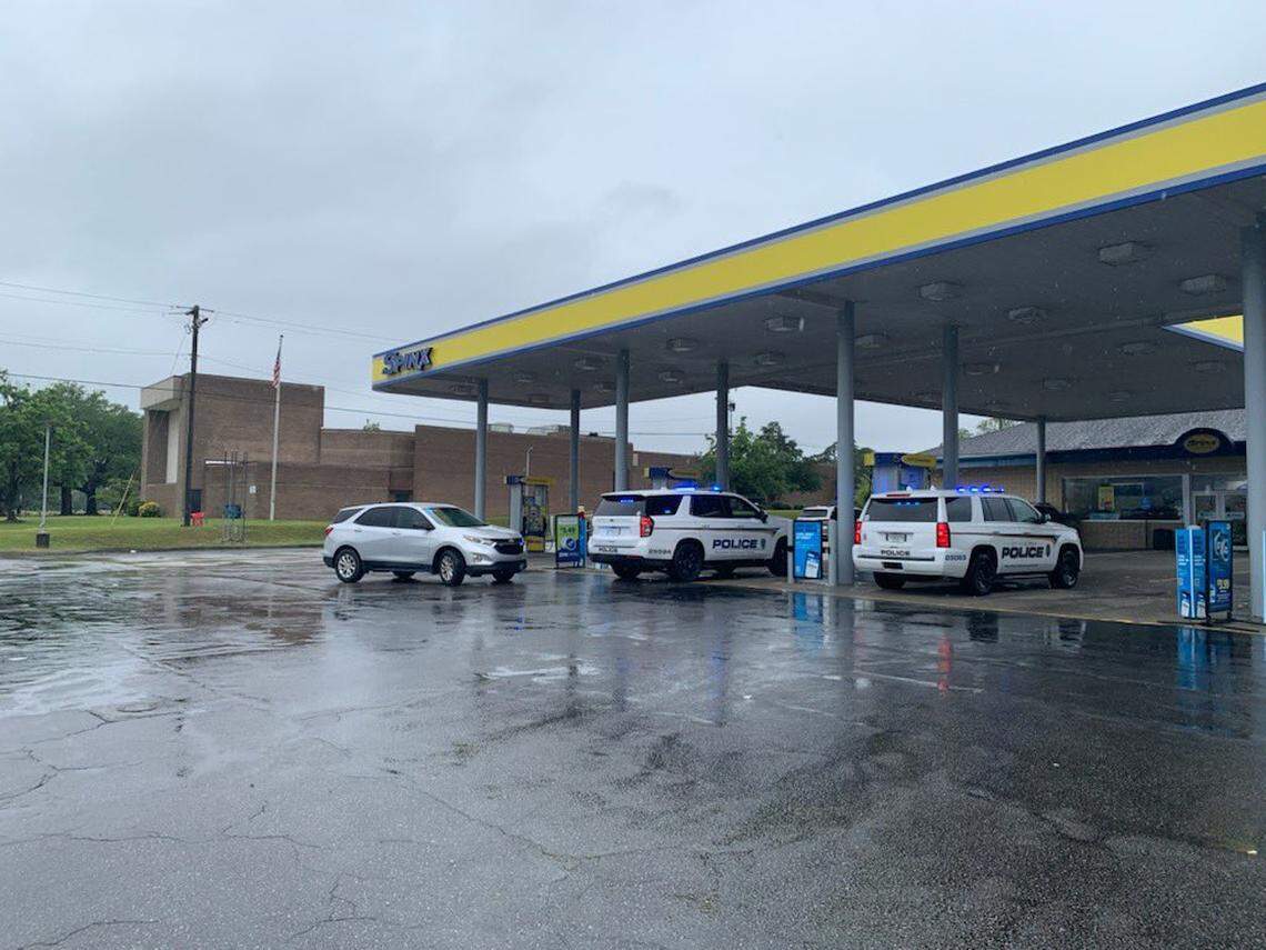 Columbia police respond to a shooting at a gas station.