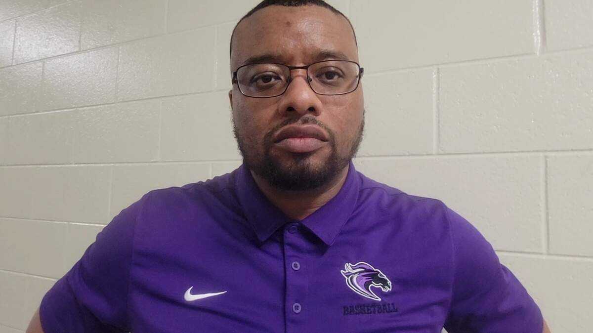 Ridge View boys basketball coach Joshua Staley talks to reporters after Friday’s win over AC Flora.