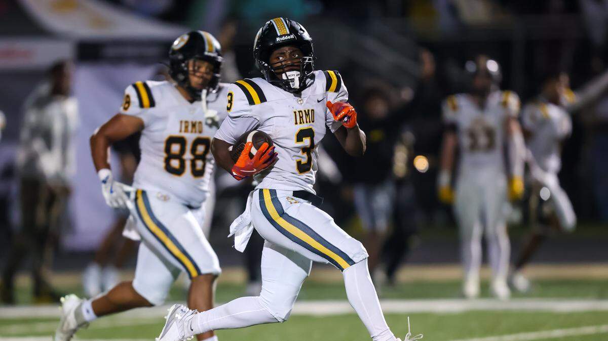 Irmo Yellow Jackets wide receiver Maleek Miller (3) runs for a long touchdown during their game at Dutch Fork High School, 11/8/24.