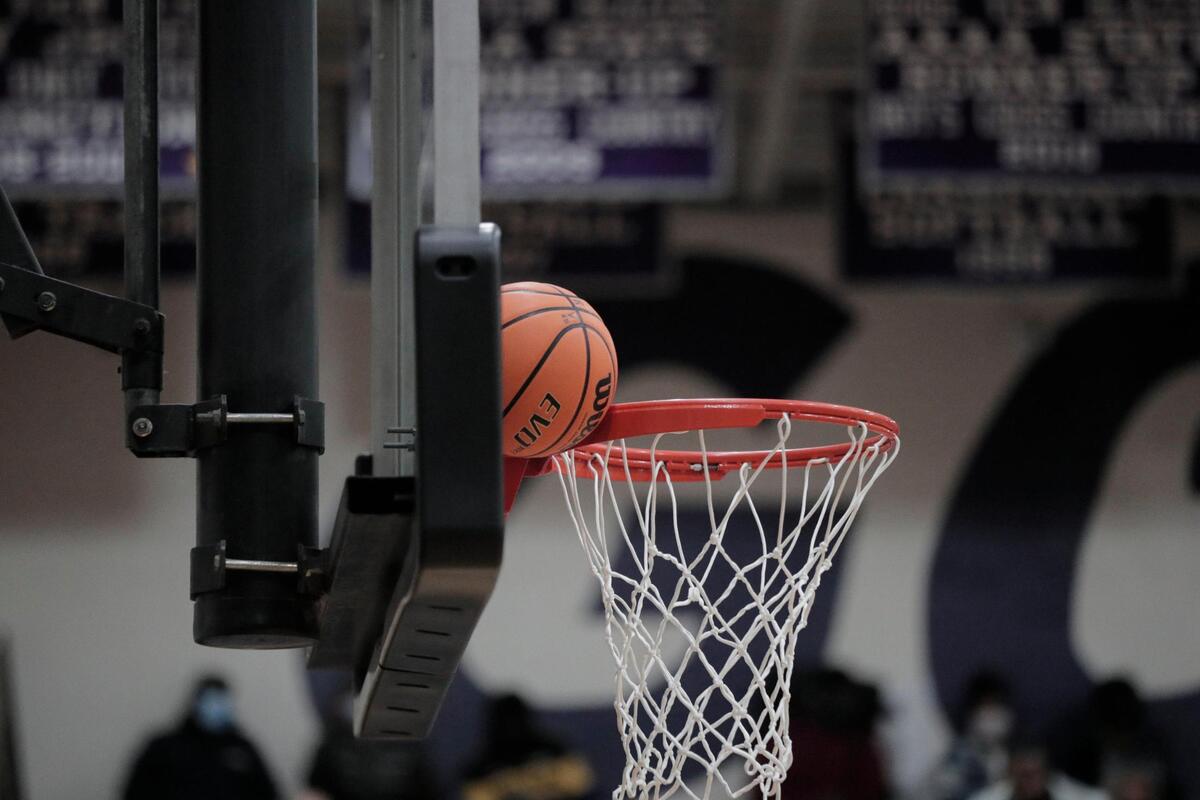 Ridge View’s buzzer-beater shot by Tyler Rice 3 is lodged between the glass and the hoop on Friday, February 26, 2021.