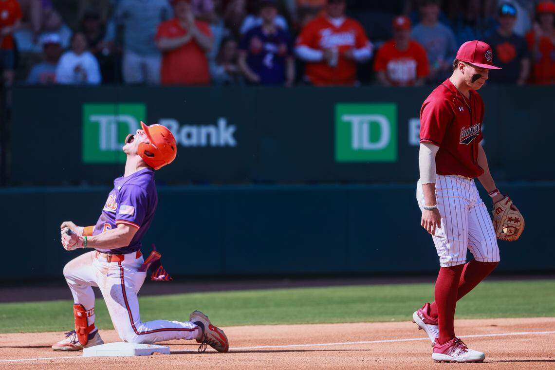 Clemson outfielder Dominic Listi (6) celebrates as South Carolina infielder KJ Scobey (19) walks away at Fluor Field in Greenville, South Carolina on Saturday, March 1, 2025.