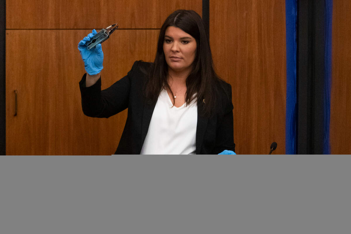 State Law Enforcement Division’s Dalila Cirencione shows a multitool that is evidence in the trial of Nathaniel Rowland at the Richland County Courthouse on Thursday, July 22, 2021. Cirencione also showed other evidence gathered at Maria Howard’s home.