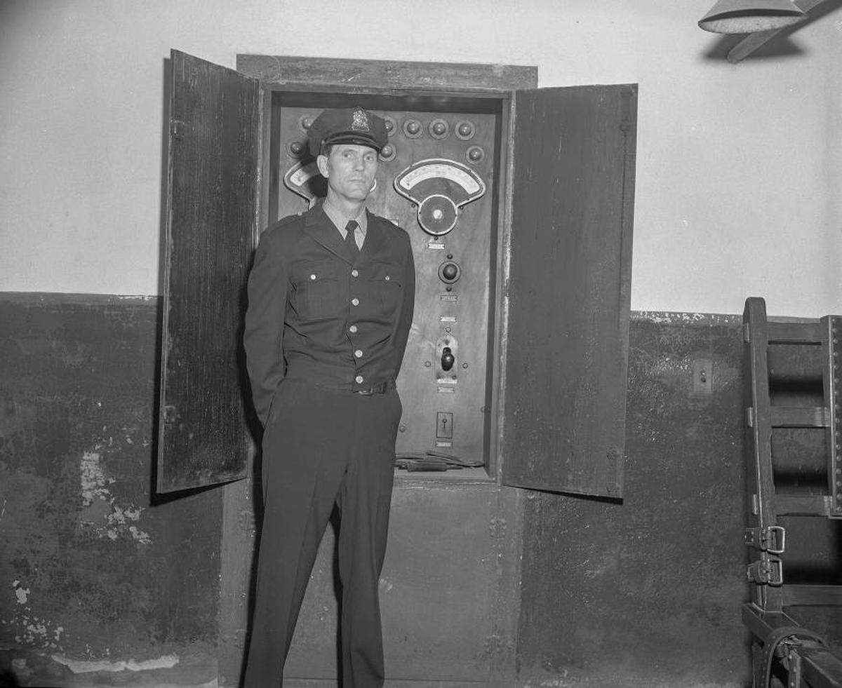 A photo dated April 6, 1961, first published in The State Newspaper, shows Everett Small, the new switchman for the electric chair at the State Penitentiary.