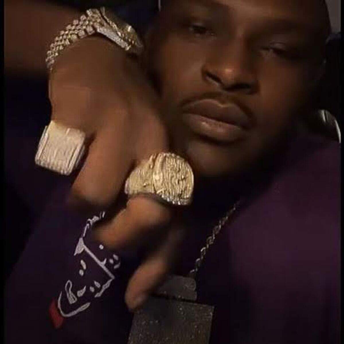 A photo of Tyler Robinson wearing his custom rings and watch. Police believe the missing items were stolen by Robinson’s killer and could be the key to solving his murder.