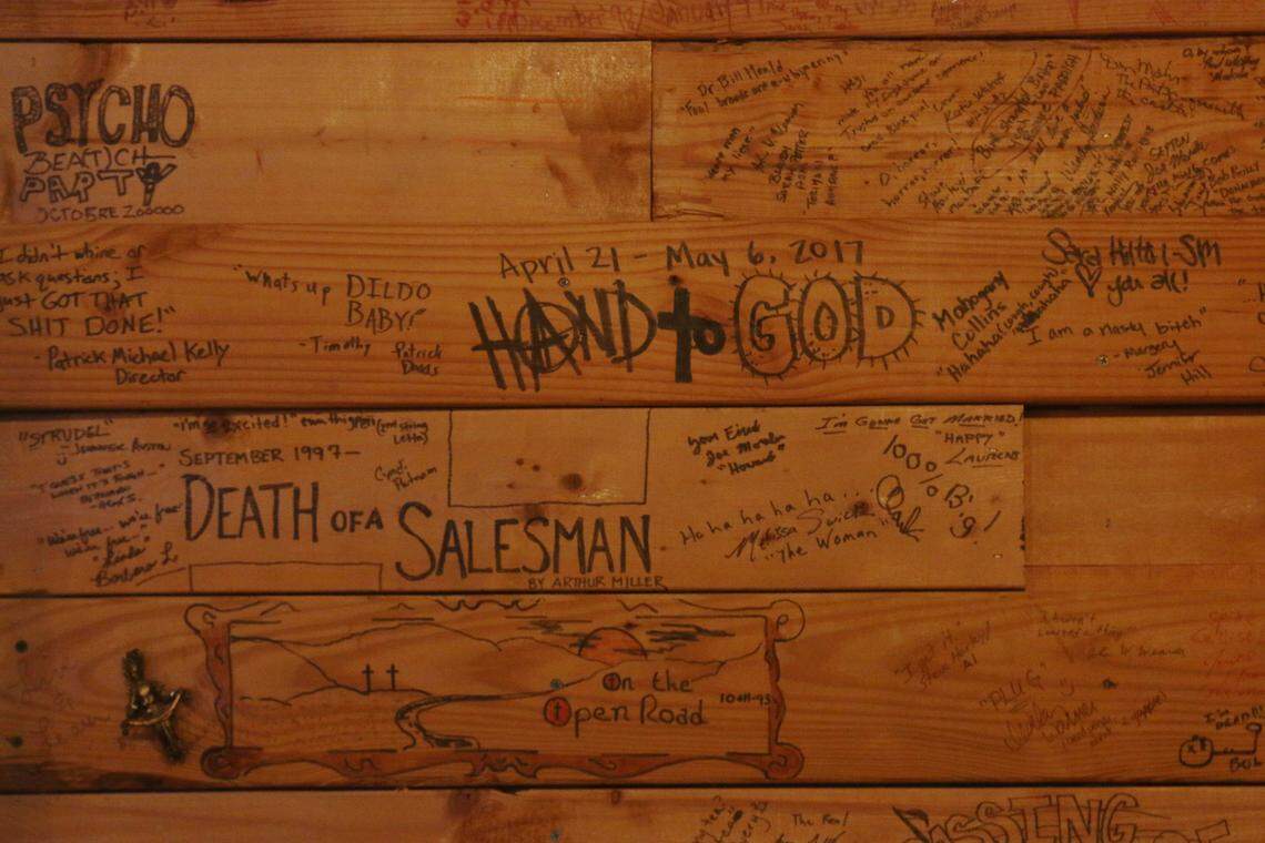An installation of boards signed by members of past Trustus productions surrounds the stage in the theater’s renovated bar. Aug. 14, 2025