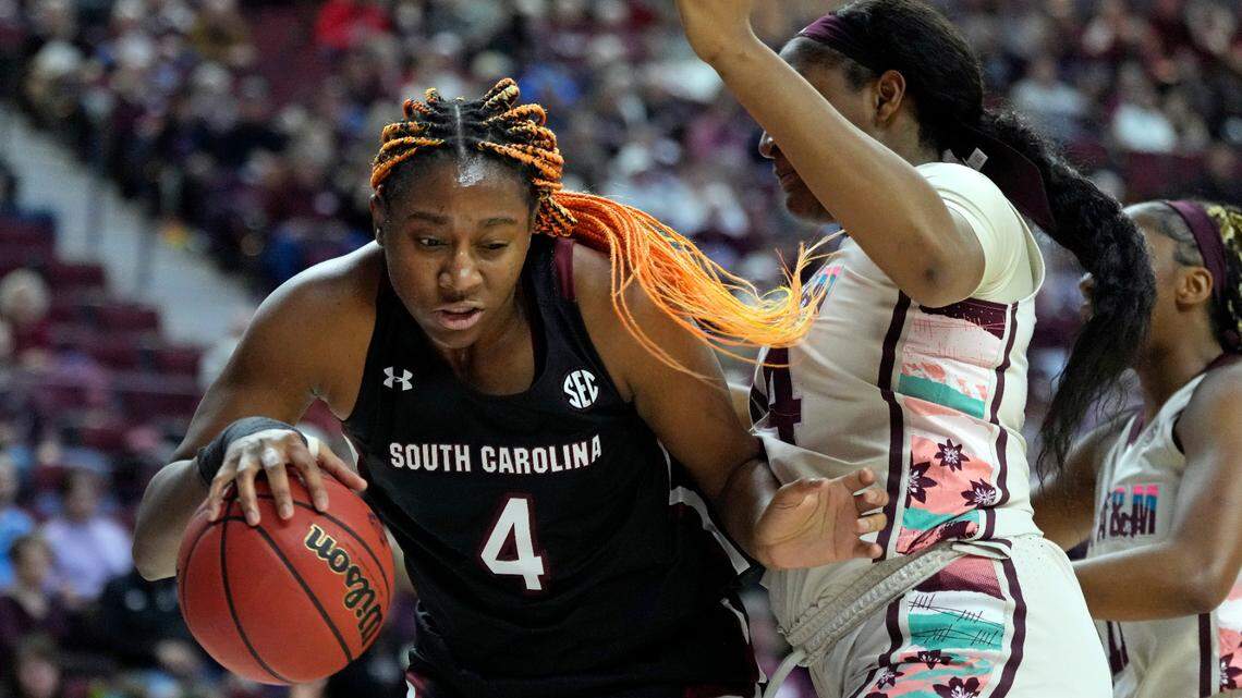 South Carolina forward Aliyah Boston (4) backs into the lane against Texas A&M center Sydnee Roby (44) during the first half of an NCAA college basketball game Thursday, Feb. 24, 2022, in College Station, Texas.