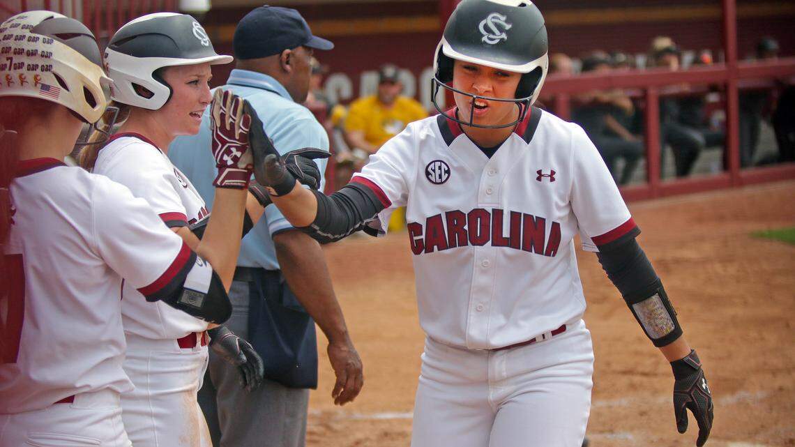 South Carolina's Krystan White, right, scores for the Gamecocks in Sunday's win over Missouri.