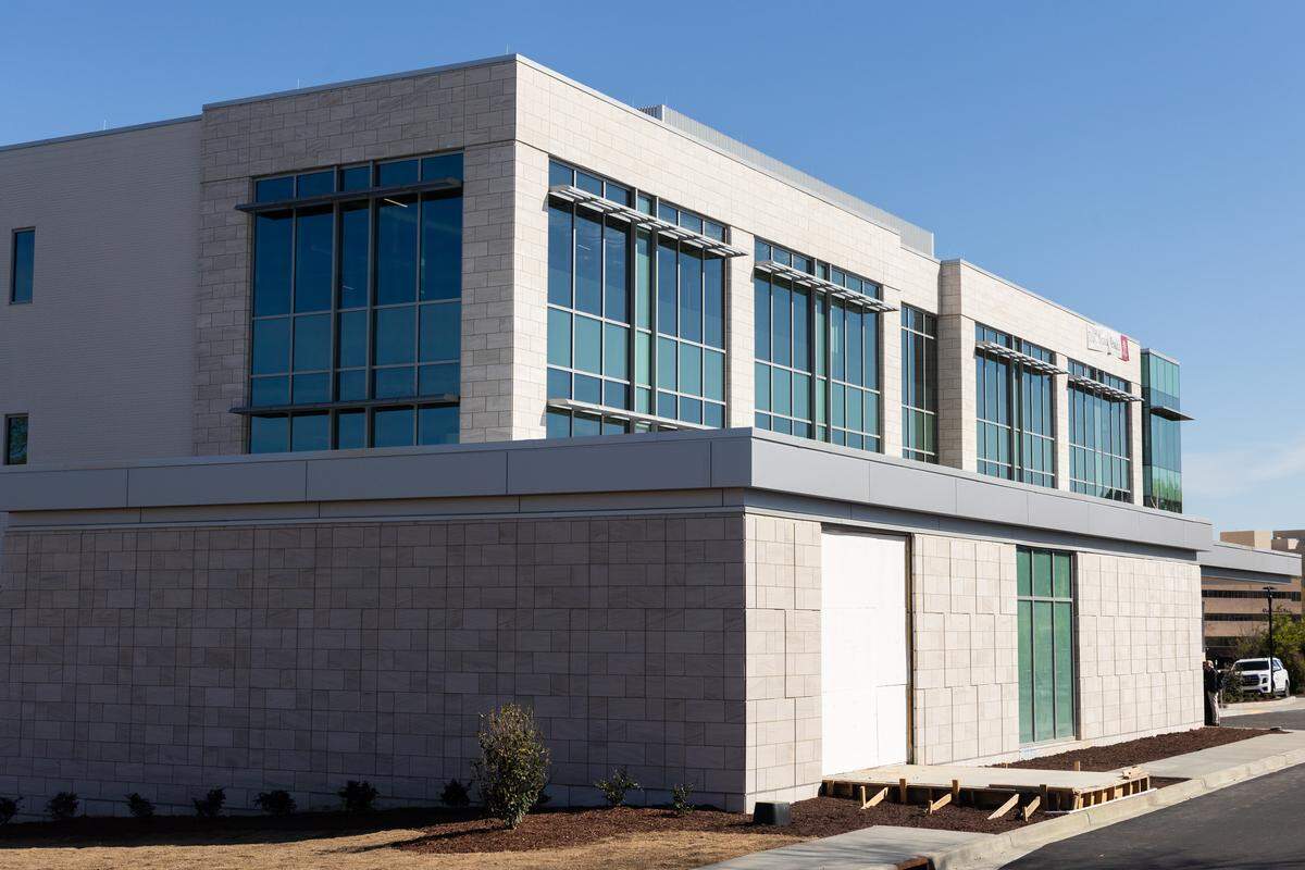 The new University of South Carolina Brain Health Center, located near the Bull Street District, on Wednesday, March 18, 2026. The front section was added to the existing office building to support the weight of a 27-ton MRI machine.