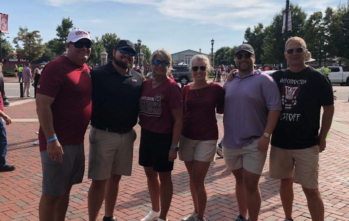 From left to right: Travis Noland, Abe Noland, Julie Noland, Susan Carman, Forrest Carman and Ed Carman pose for a photo outside Williams-Brice Stadium ahead of South Carolina quarterback Zeb Noland’s first start as a Gamecock.
