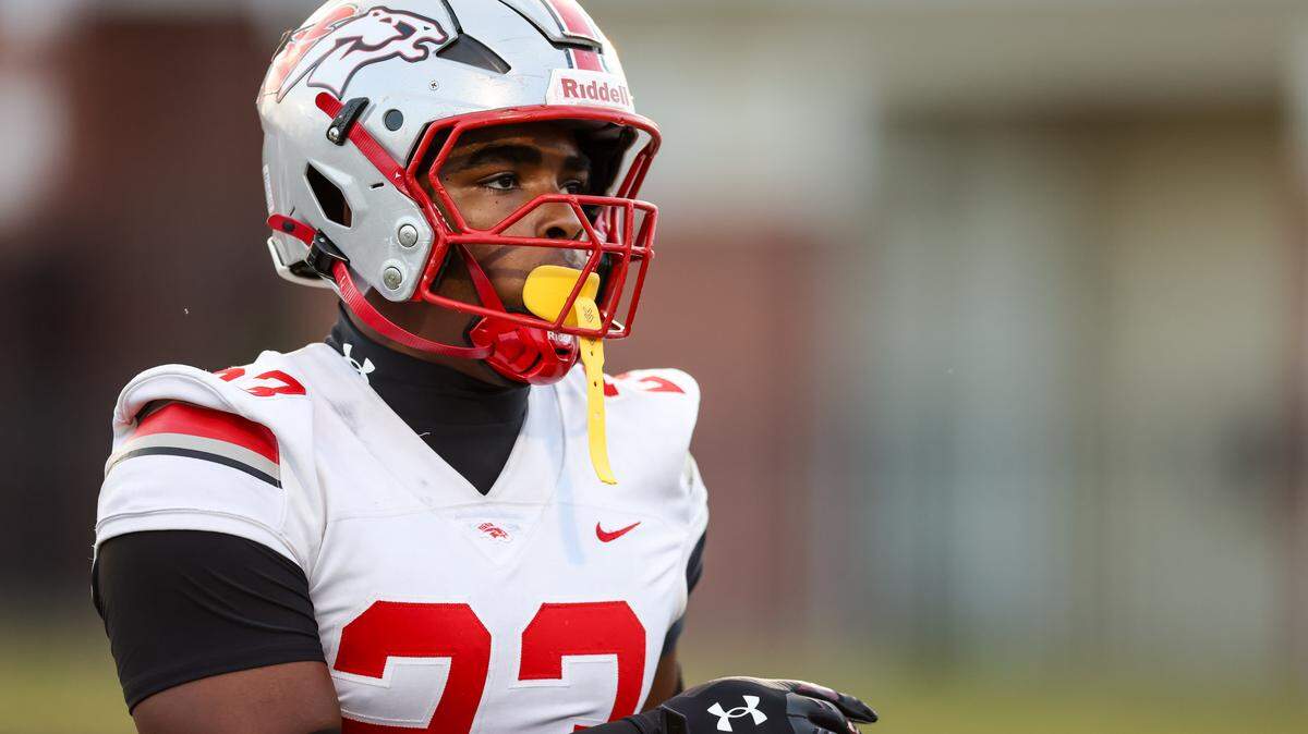 Seth Tillman (23) of South Pointe warms up before AC Flora’s game against South Pointe at Memorial Stadium on Friday, September 19, 2025.