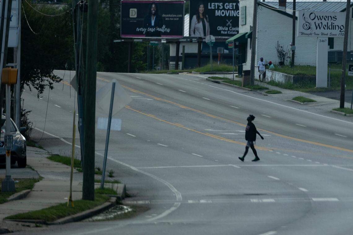 Pedestrians cross Millwood Avenue on Tuesday, June 11, 2024.