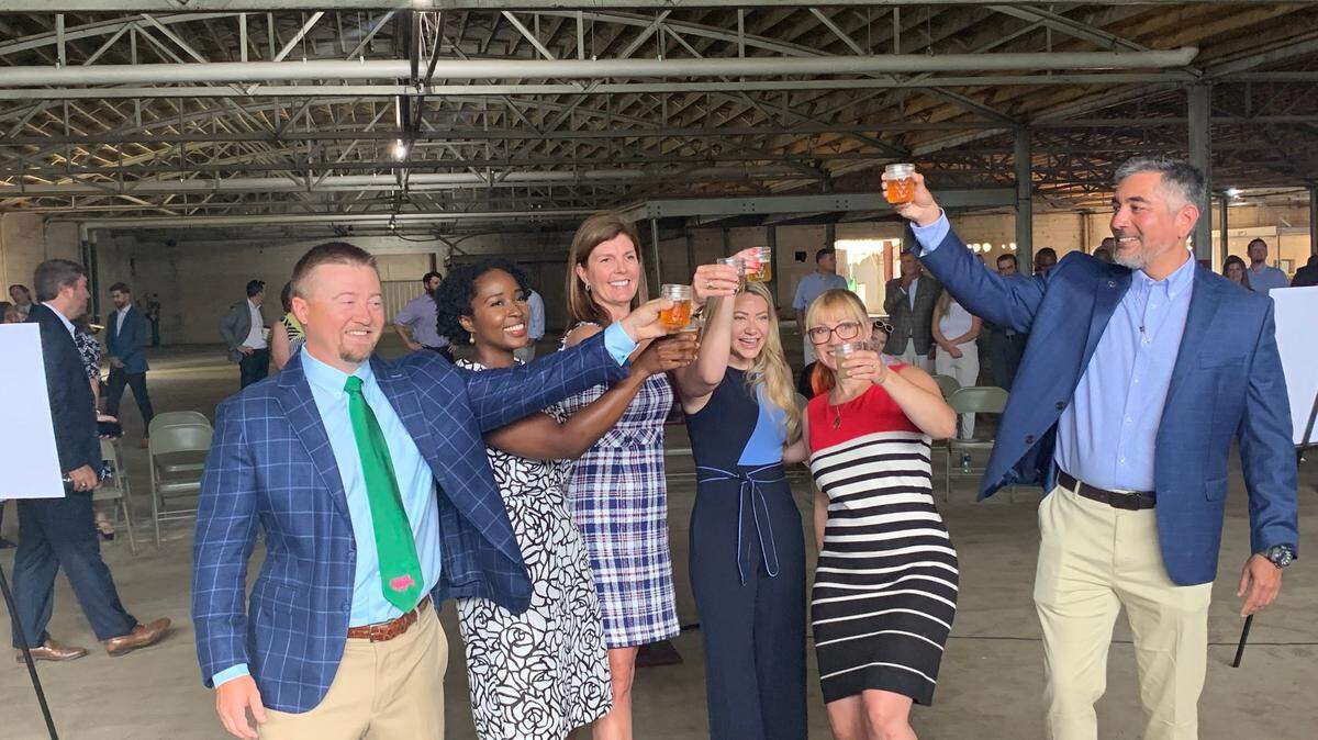 Peak Drift Brewing Company will open in 2022 at 3452 North Main St. in Columbia, SC. From left to right: Co-owner Greg Middleton, Alyssa Richardson on behalf of Senator Tim Scott, Lt. Gov. Pamela Evette, co-owner Sara Middleton, head brewmaster Ashley Kinart-Short and Brian Johnston with Mashburn Construction raise a glass.