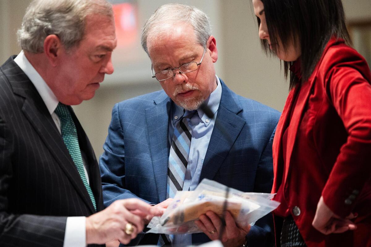 Defense attorney Dick Harpootlian, prosecutor Creighton Waters and prosecutor Savanna Goude review evidence in Alex Murdaugh’s trial for murder at the Colleton County Courthouse on Friday, January 27, 2023. Joshua Boucher/The State/Pool