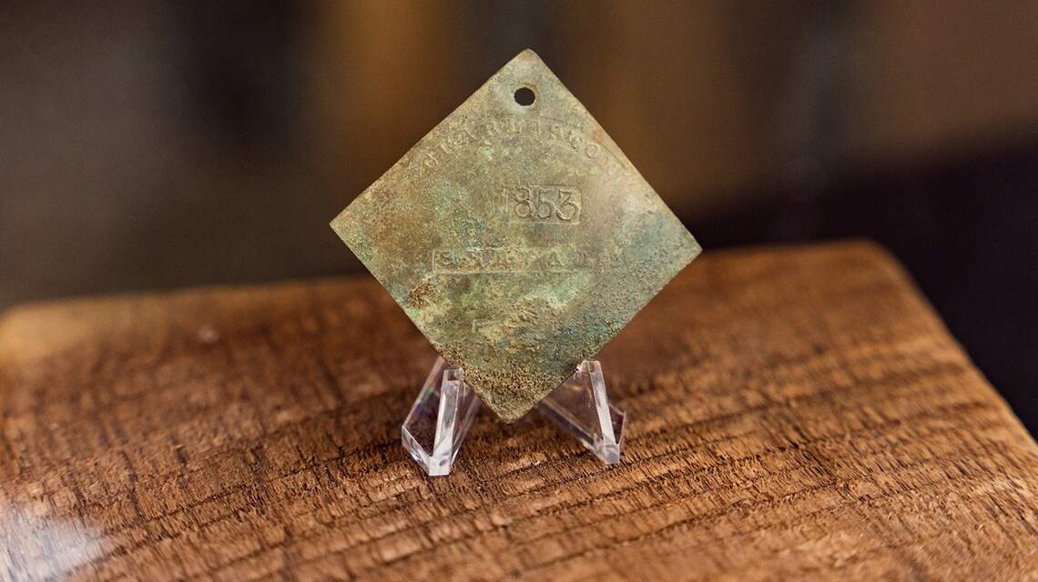 Charleston slave badge named among the world’s top archaeological discoveries of 2021