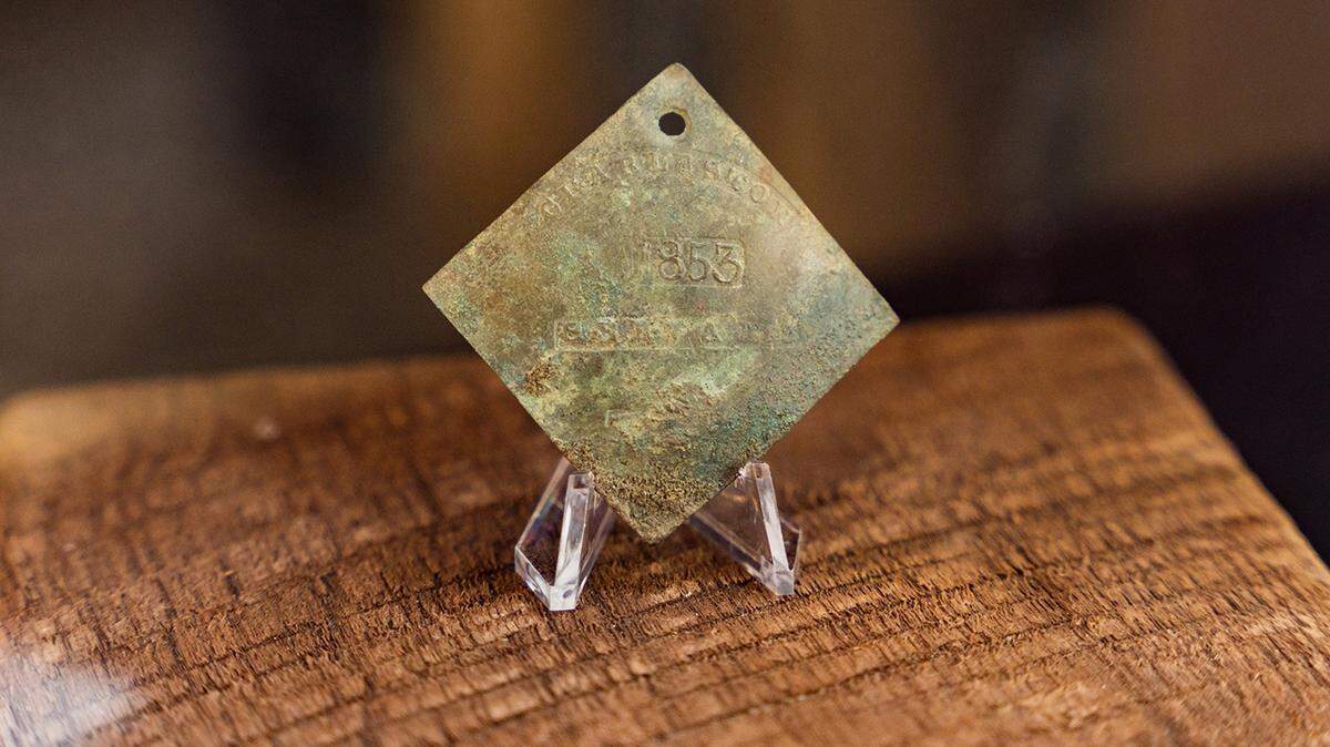The 1853 slave badge was discovered by College of Charleston students and faculty in March during an excavation on the campus.