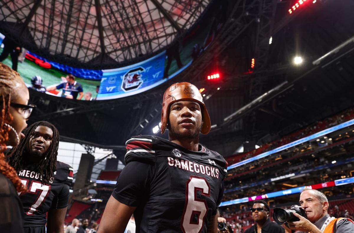 South Carolina edge Dylan Stewart (6) wears the leather helmet Sunday at Mercedes-Benz Stadium in Atlanta. The Gamecocks and Hokies faced off Aug. 31 in the 2025 Aflac Kickoff Game.