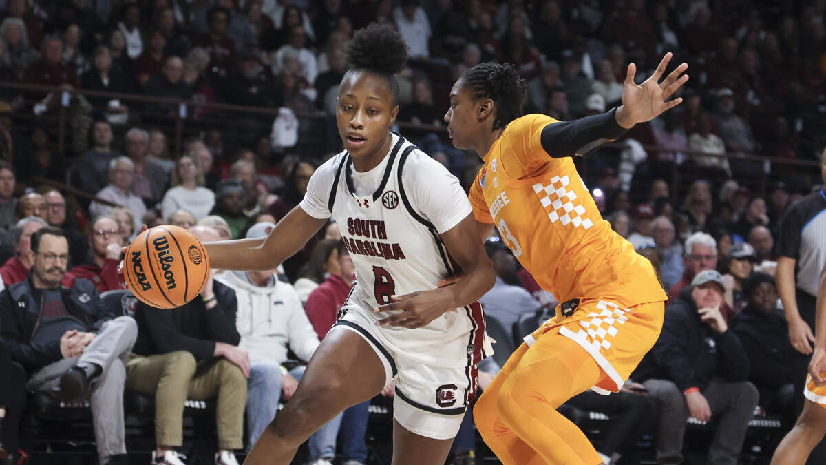 South Carolina's Joyce Edwards (8) tries to drive around Tennessee's Mia Pauldo during the first half against Tennessee at Colonial Life Arena on Sunday, Feb. 8, 2026.