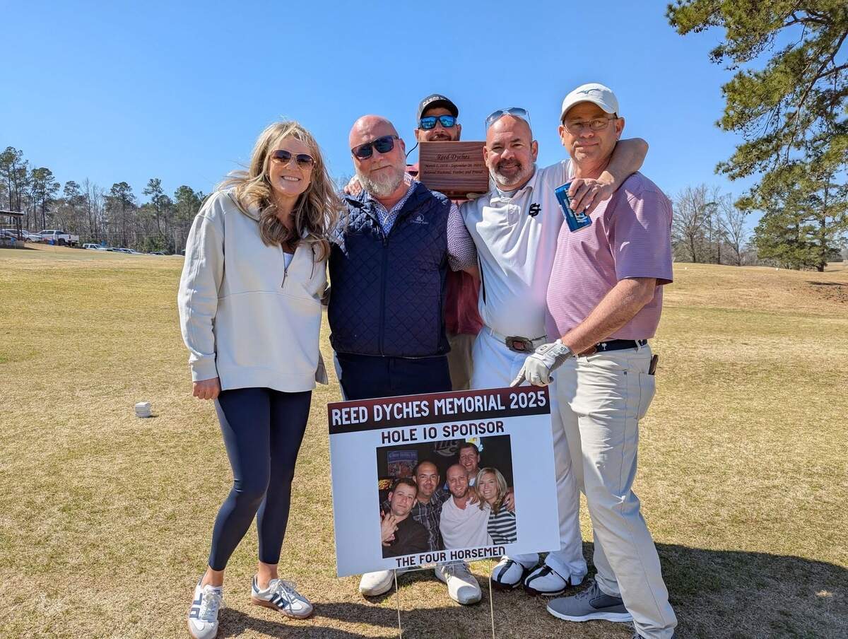 Some of Reed Dyches’ friends at his memorial golf tournament in March.